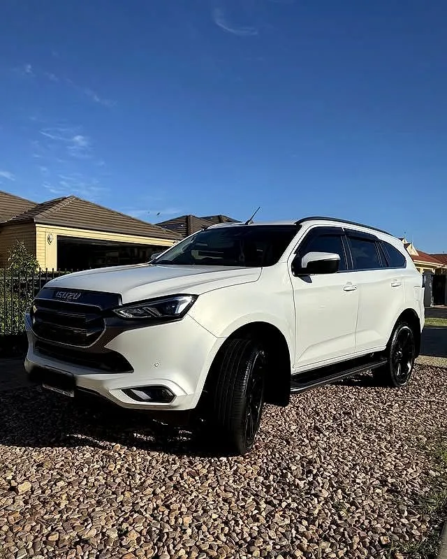 White Isuzu SUV detailed in a driveway in Adelaide's north